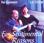 Kai Heumann im Anzug mit Jazzgitarre und die chinesische Sängerin Lei Errenst